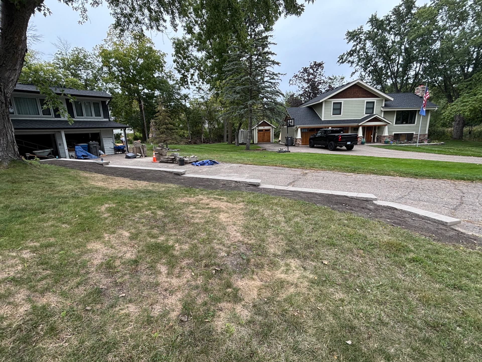 Gallery photos for Porcelain Paver Patio, Fire Pit and Retaining Walls in Hopkins: Image #4
