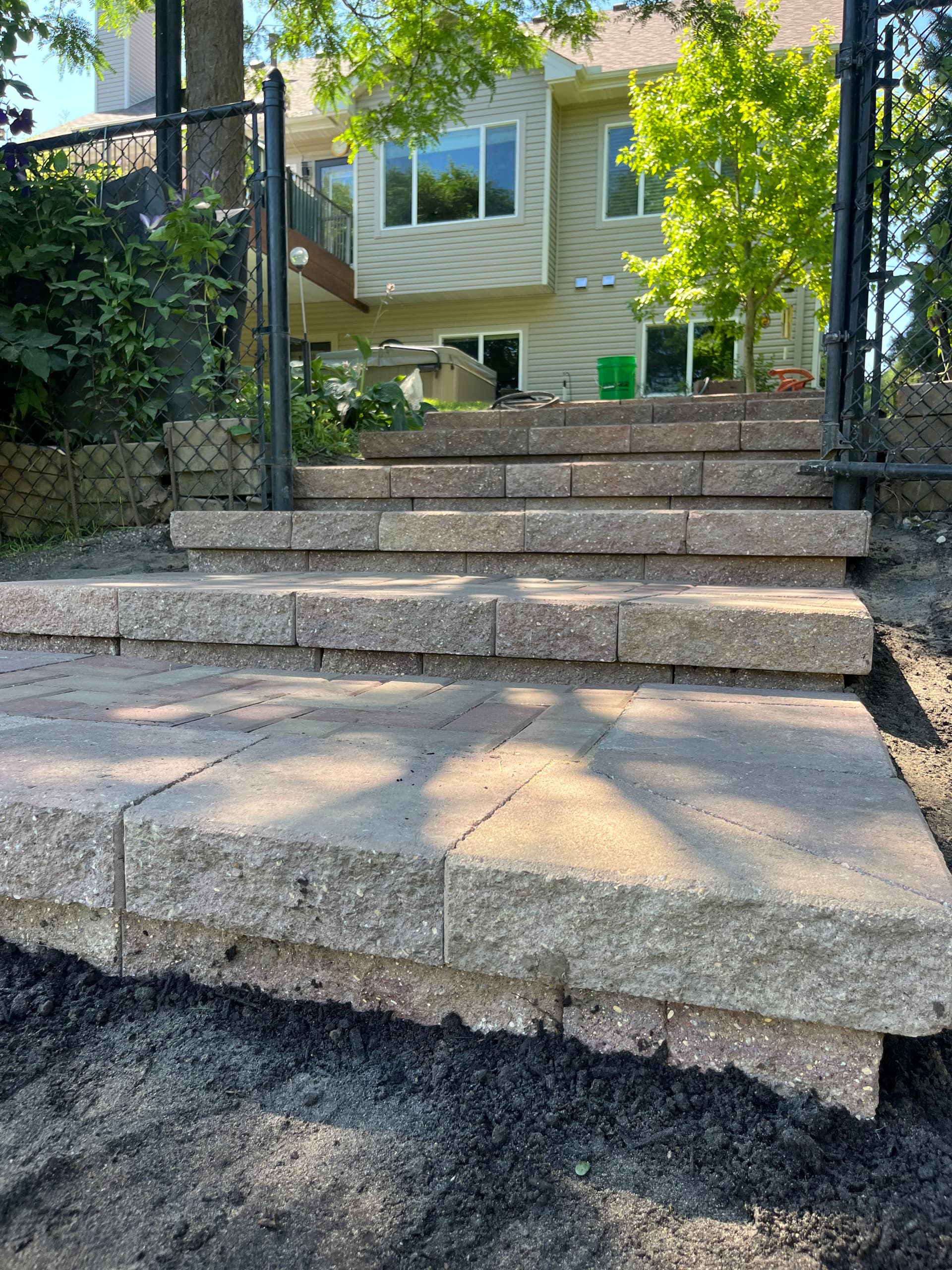 Retaining Block Steps Built Down a Steep Backyard Slope