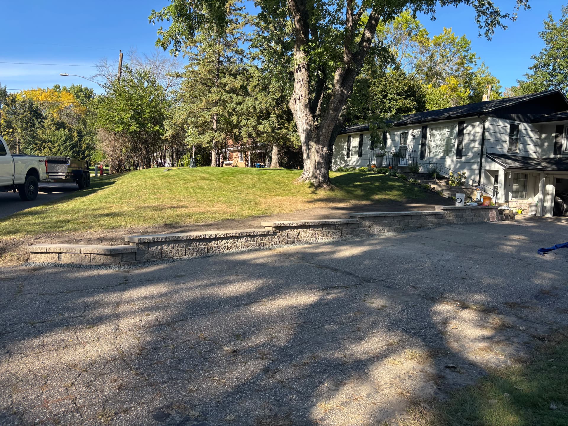 Gallery photos for Porcelain Paver Patio, Fire Pit and Retaining Walls in Hopkins: Image #3