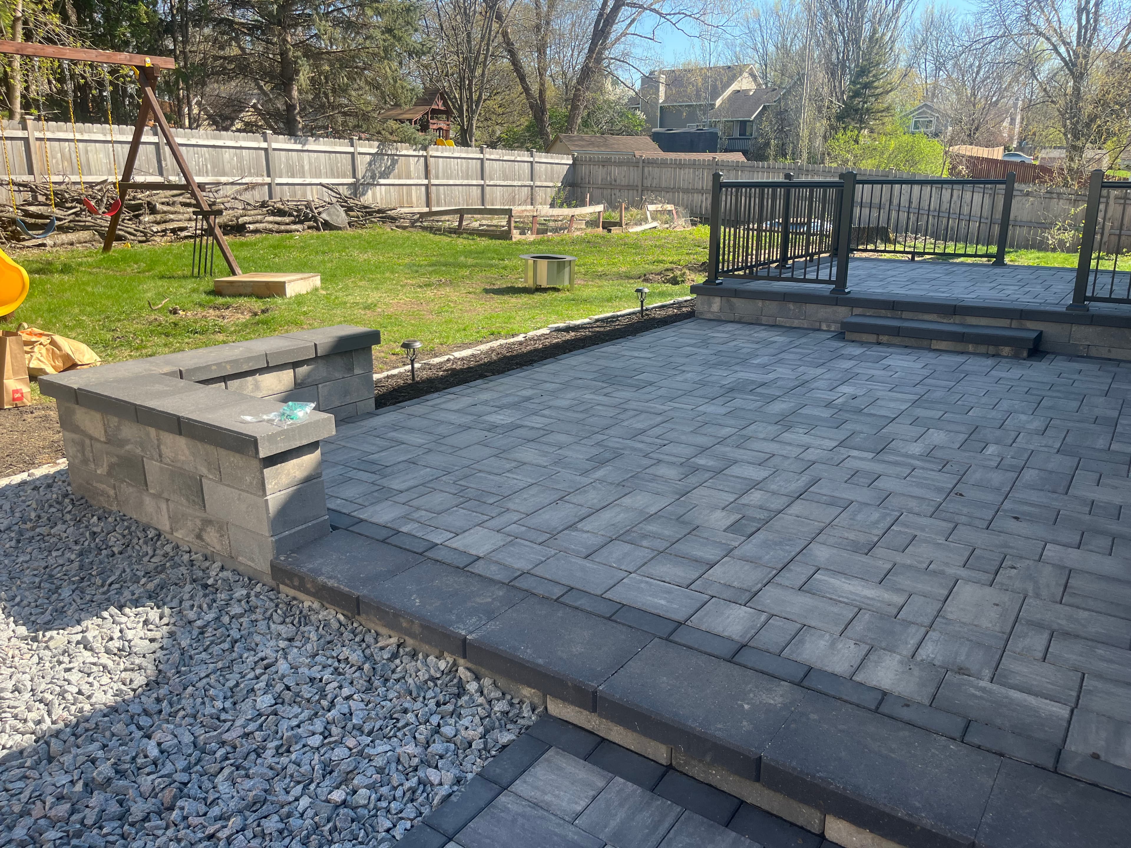 Project Paver Patio Build With Railing Lighting and Flagstone Steppers image