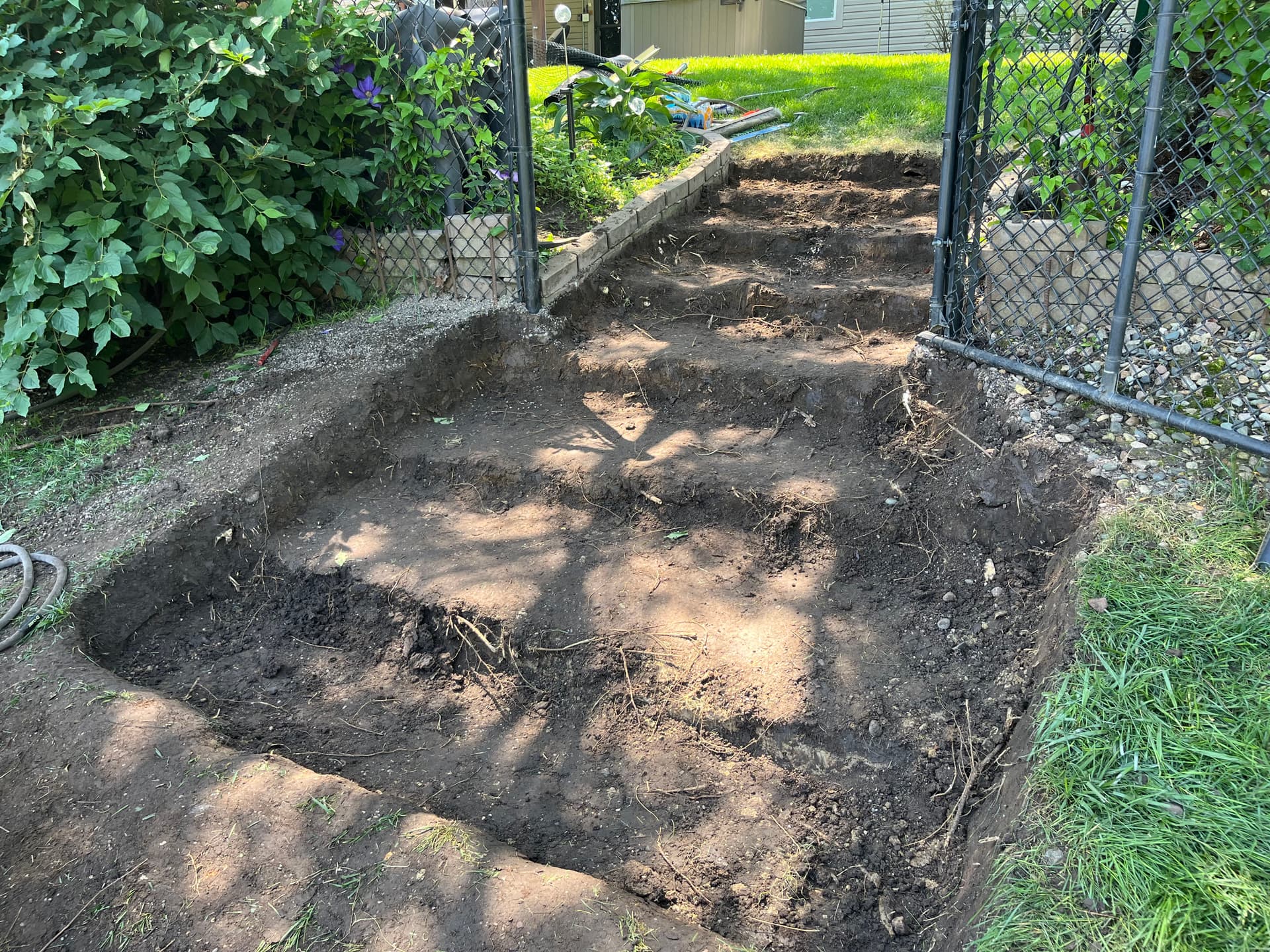 Retaining Block Steps Built Down a Steep Backyard Slope