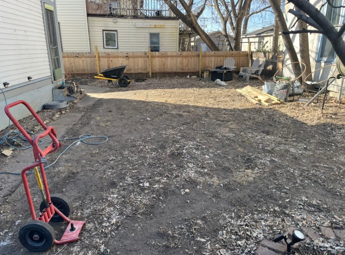 Minneapolis Backyard Gets a Concrete Patio, Sod, and Plant Beds