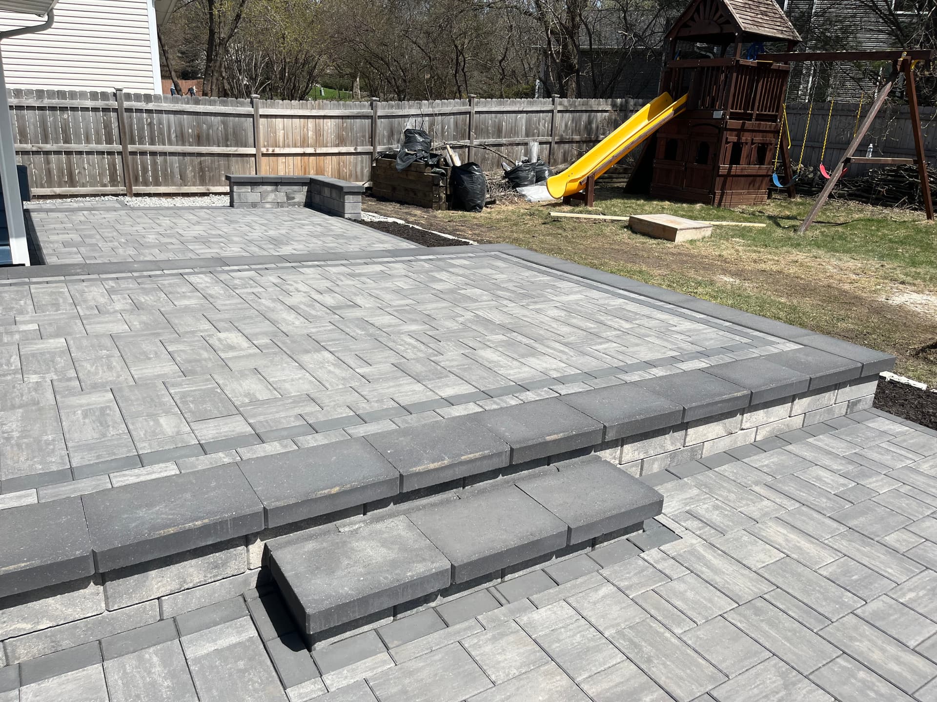 Gallery photos for Paver Patio Build With Railing Lighting and Flagstone Steppers: Image #3