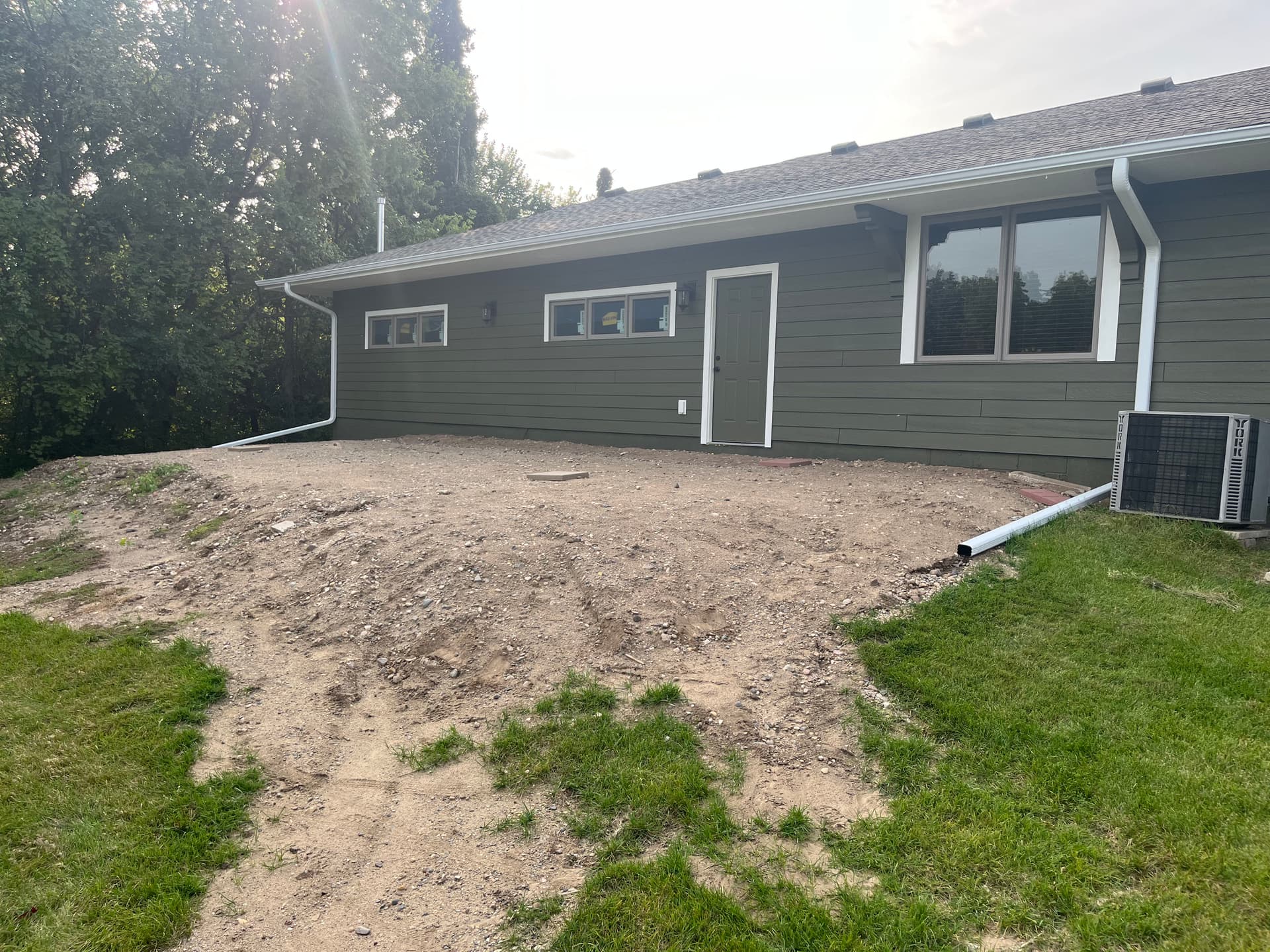 Gallery photos for Steep Slope Turned Usable Space with a Retaining Wall in Bloomington: Image #1