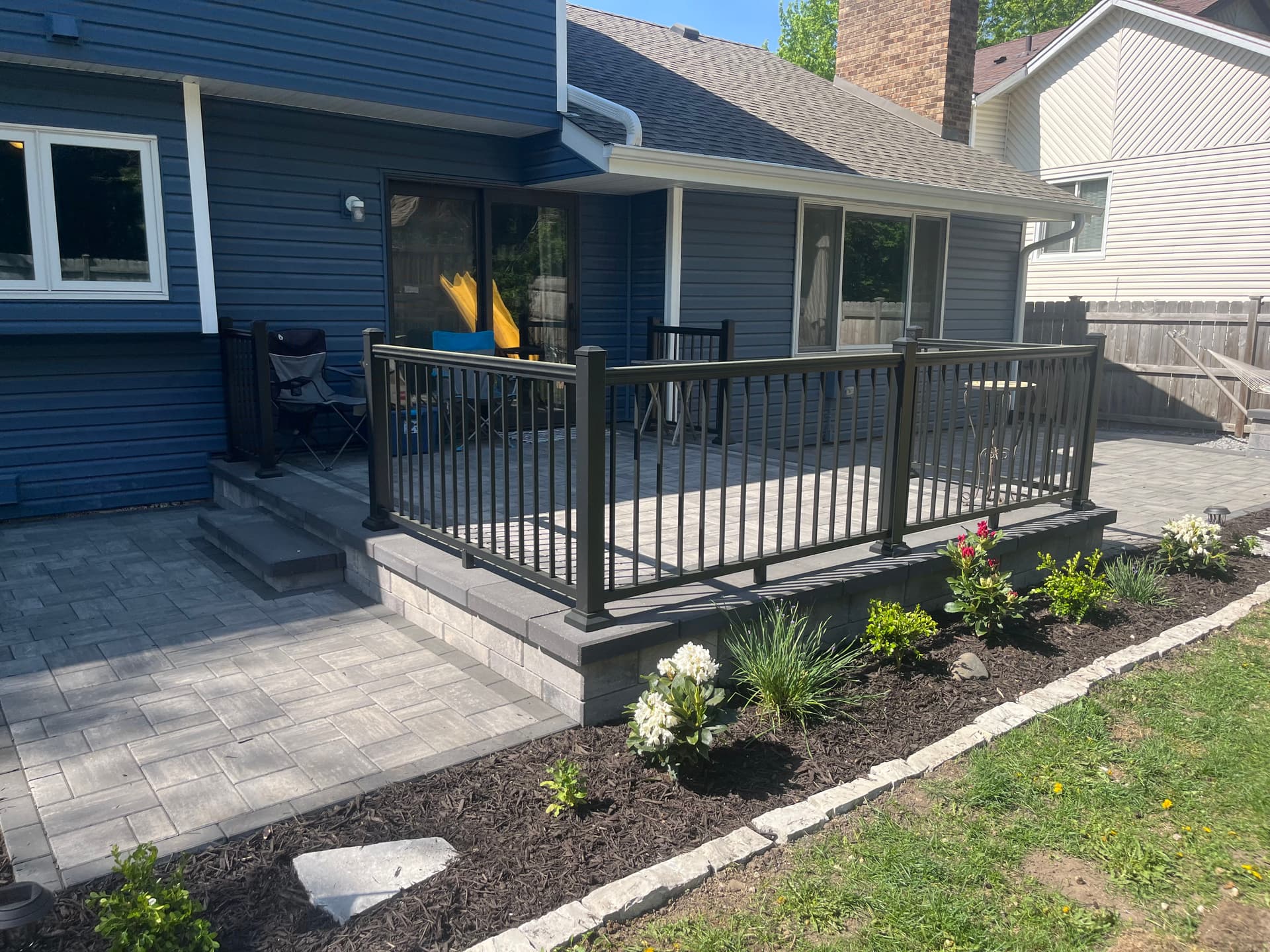 Gallery photos for Paver Patio Build With Railing Lighting and Flagstone Steppers: Image #1